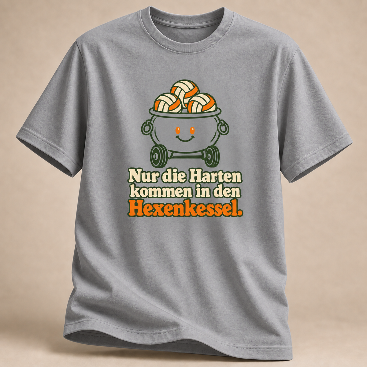 Frontansicht eines sportgrau melierten T-Shirts: Volleyballmotiv mit Hexenkessel und drei Bällen.